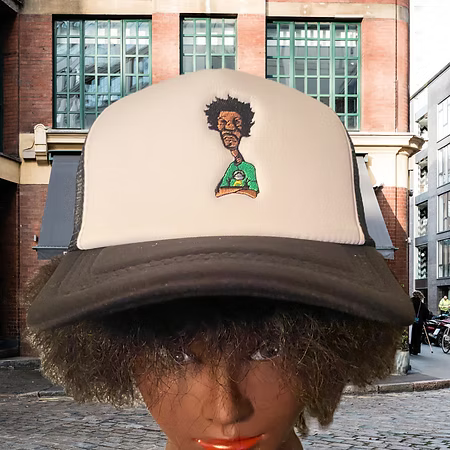 Nickel G. Black and White With Green Logo Unisex Trucker Cap